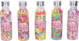 Színes gyöngyök üvegcsében