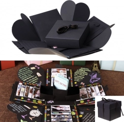 Fekete robbanó ajándékdoboz