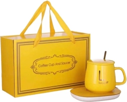 Elektromos italtartó melegítő sárga bögrével és kanállal