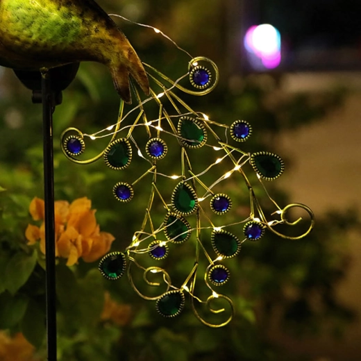 Ragyogó pávatoll LED-ekkel