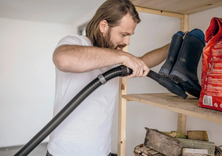 Okos tartozéktárolás és a tömlő elhelyezése a készülék fején