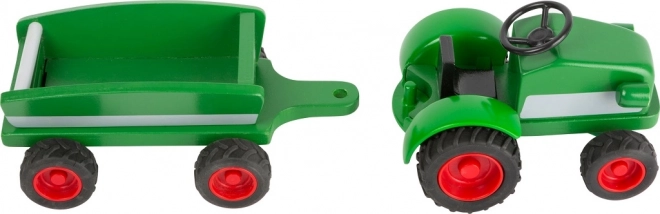 Dřevěný traktor zöld utánfutóval