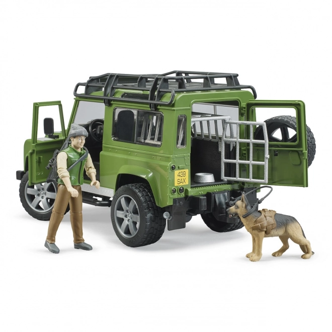 bruder land rover defender vadász figurával és kutyával