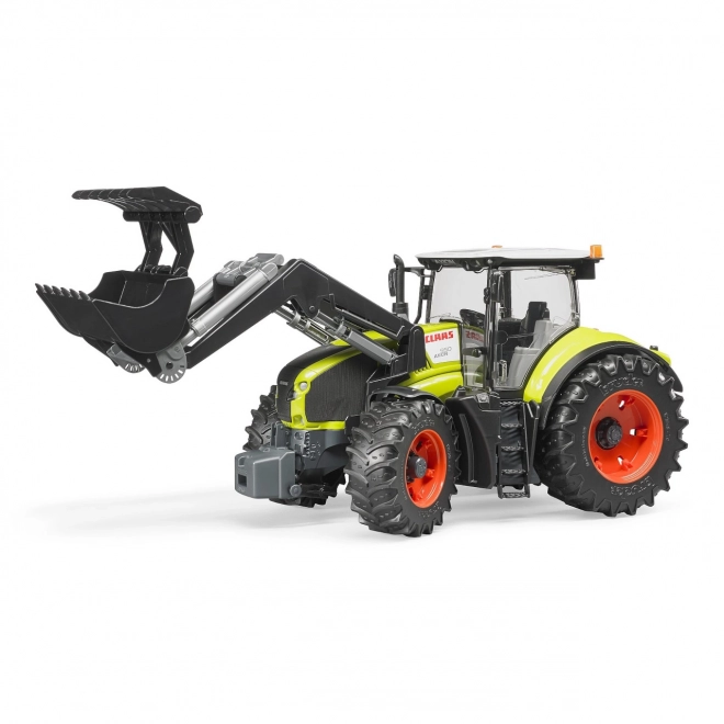 Claas Axion 950 traktor homlokrakodóval