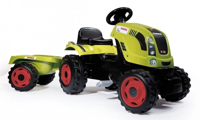 Zöld Claas pedálos traktor utánfutóval