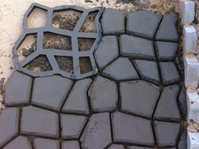 Újrahasználható betonkő öntőforma macskafej mintával