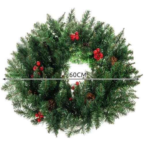 Díszítő karácsonyi koszorú ajtóra
