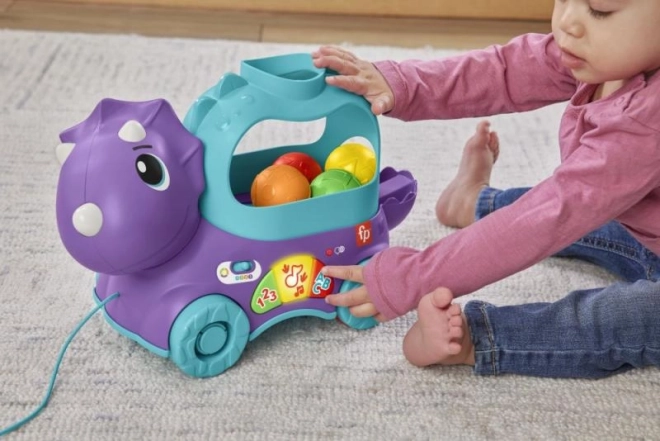 Fisher-Price dínó játék kipattanó golyókkal